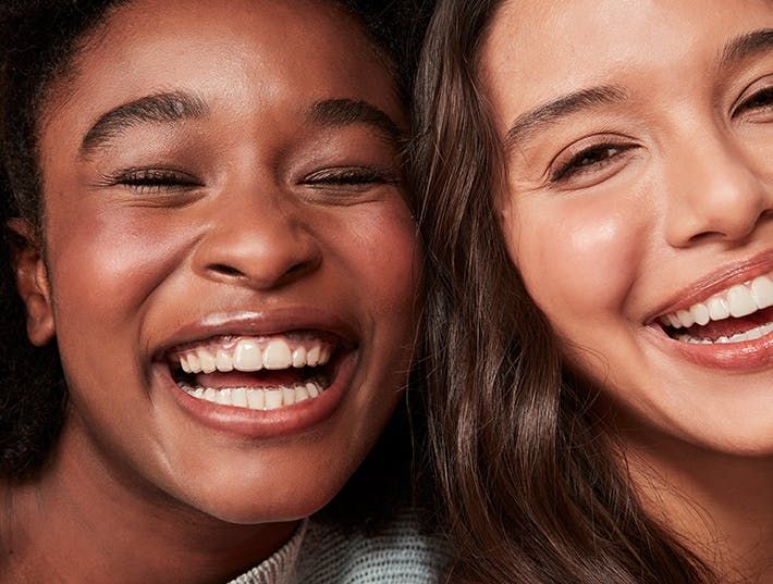 Friends smiling with confidence